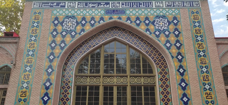 Prayer hall facade decorated with blue and turquoise tiles at Yerevan Blue Mosque