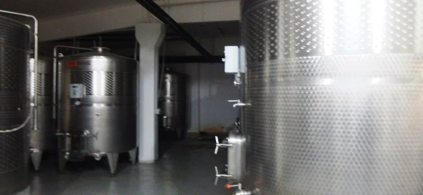 Stainless steel wine tanks inside Hin Areni Winery