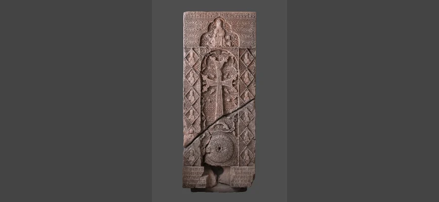 Intricately carved fourteenth-century khachkar by Momik from Noravank