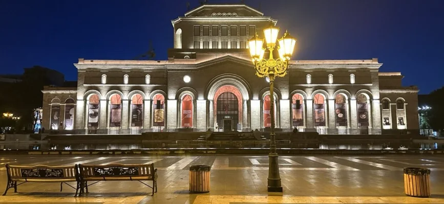 Illuminated facade of the National Gallery of Armenia on Republic Square
