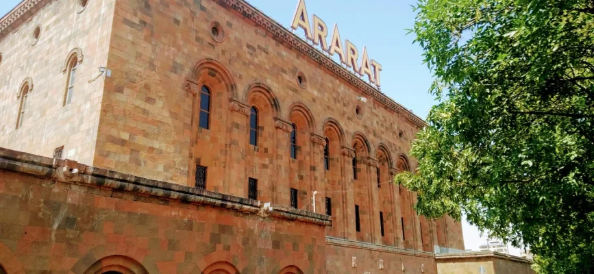 Monumental main building of Yerevan Brandy Company near Victory Bridge